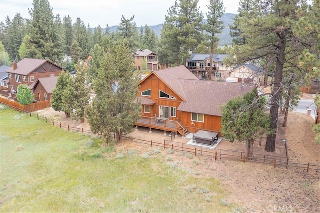 birds eye view of property featuring a mountain view