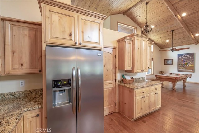 kitchen with light stone counters, wood ceiling, stainless steel refrigerator with ice dispenser, light brown cabinetry, and light wood finished floors