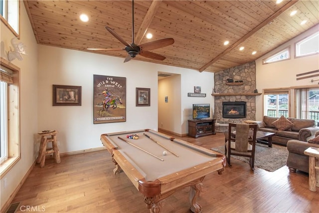 playroom with light wood finished floors, visible vents, wood ceiling, high vaulted ceiling, and beam ceiling