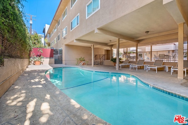 view of pool with a patio