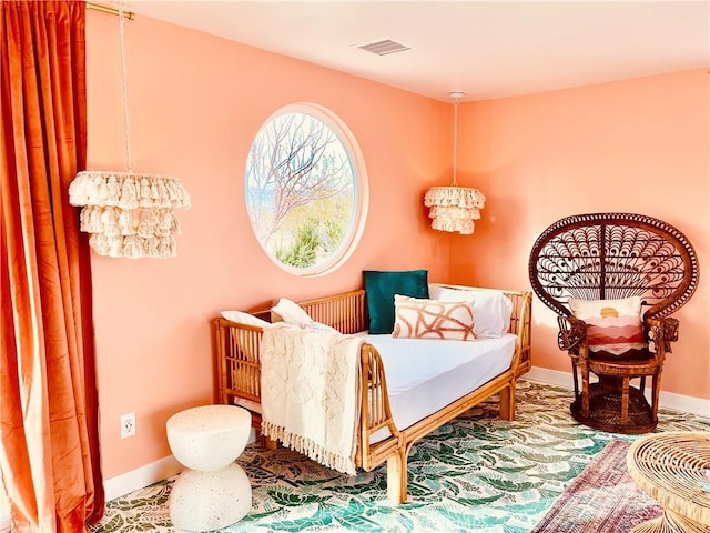 sitting room with an inviting chandelier