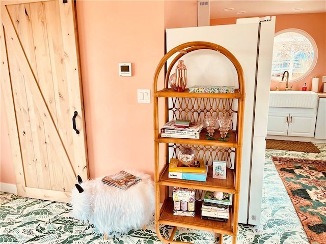 room details featuring white dishwasher and sink