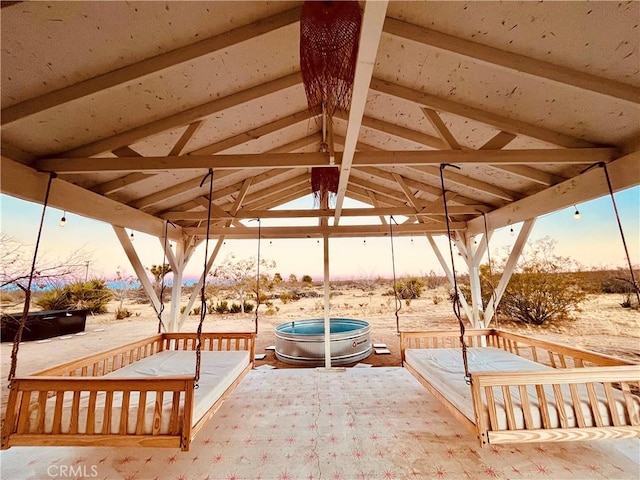 patio terrace at dusk with a gazebo