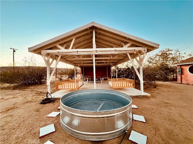 view of patio / terrace with a gazebo and a jacuzzi