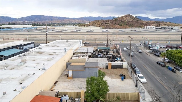 birds eye view of property with a mountain view