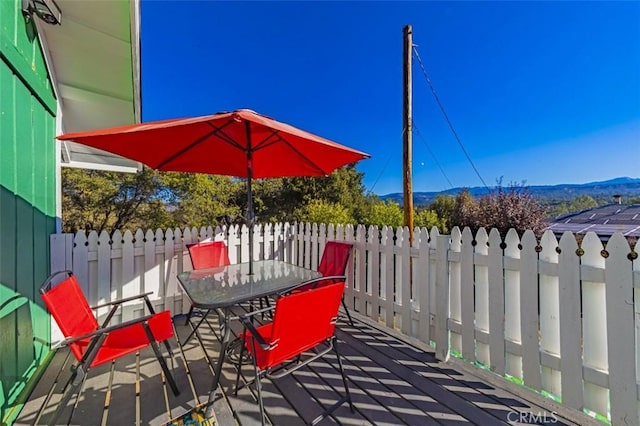 view of patio / terrace with a mountain view