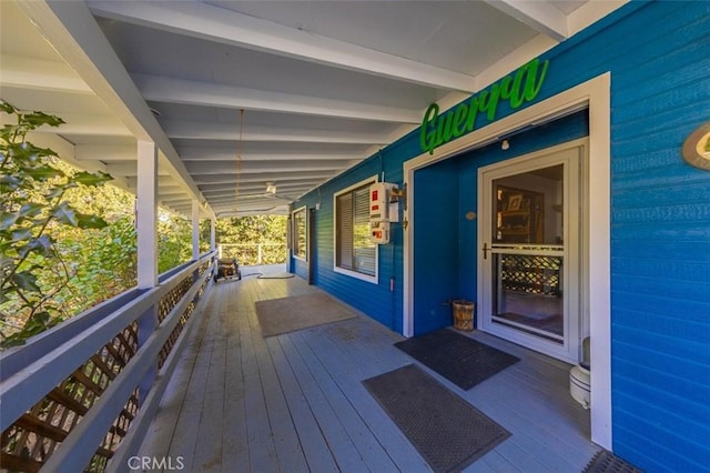 deck featuring covered porch