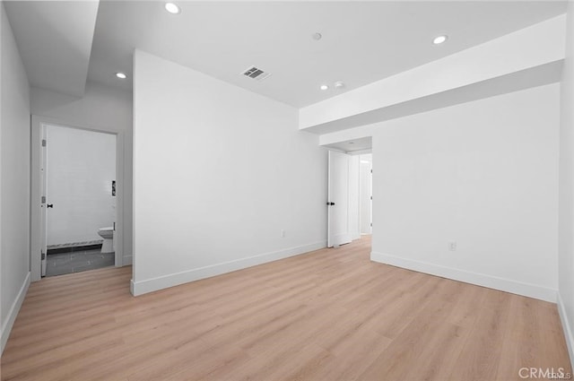 empty room with light wood-type flooring