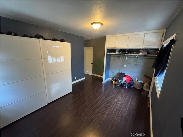 interior space with dark wood-type flooring