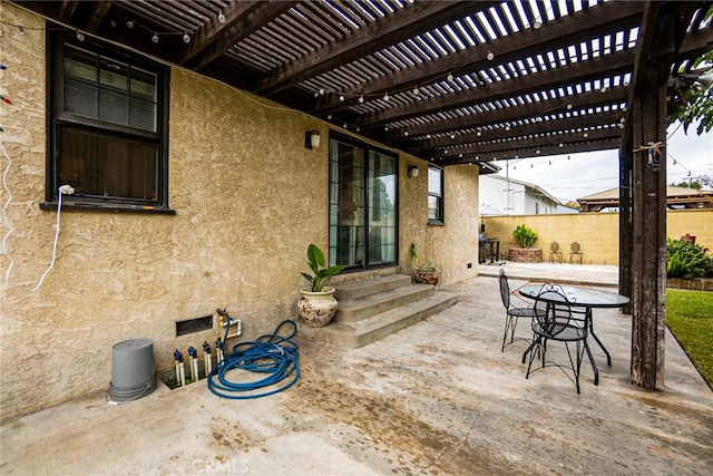 view of patio featuring a pergola