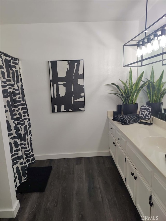 interior space featuring vanity and hardwood / wood-style flooring