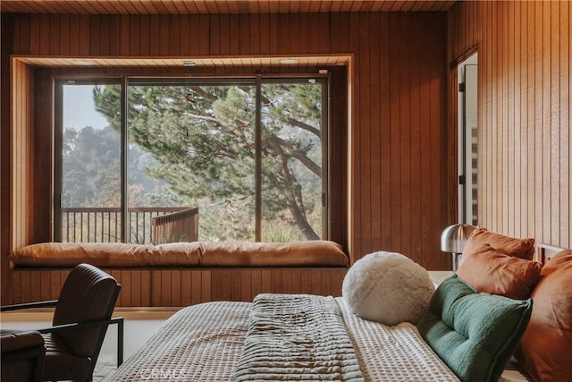 sunroom featuring wood ceiling