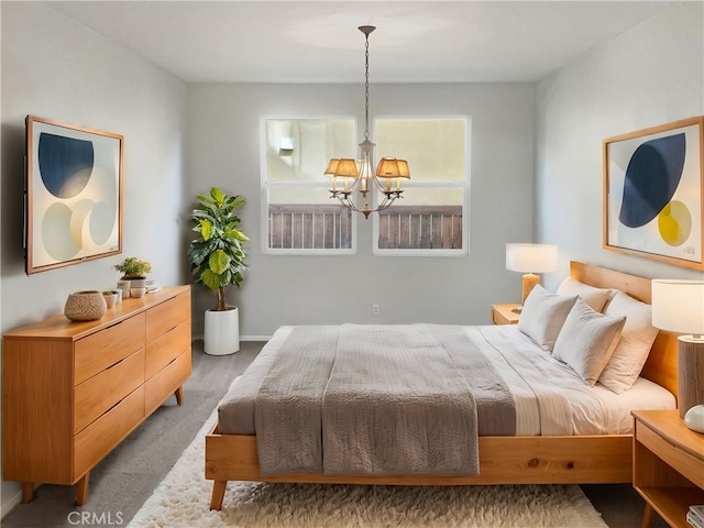 bedroom with an inviting chandelier