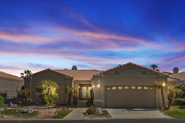 view of front of home with a garage