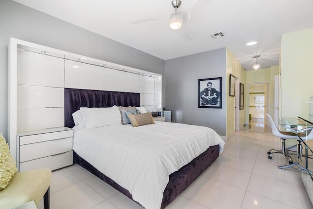 tiled bedroom with ceiling fan