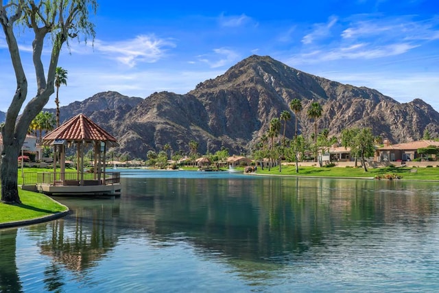 water view featuring a gazebo and a mountain view