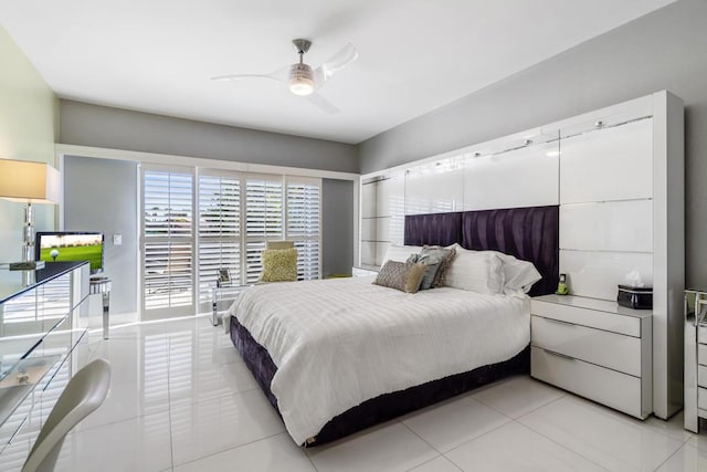 tiled bedroom with ceiling fan