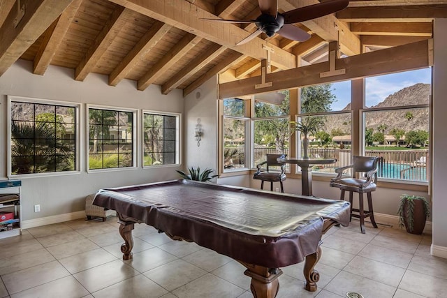 recreation room featuring wood ceiling, ceiling fan, light tile patterned floors, beamed ceiling, and pool table