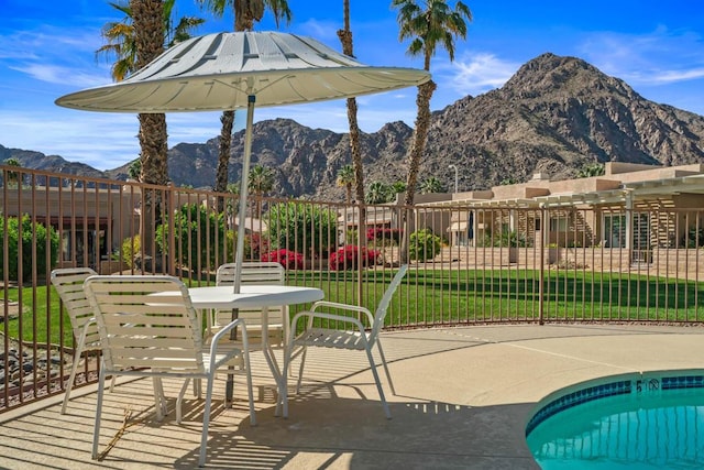 view of patio with a mountain view