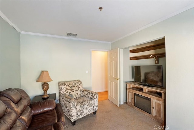 carpeted living room featuring crown molding