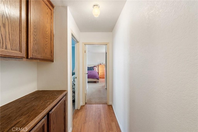 hallway featuring light hardwood / wood-style floors