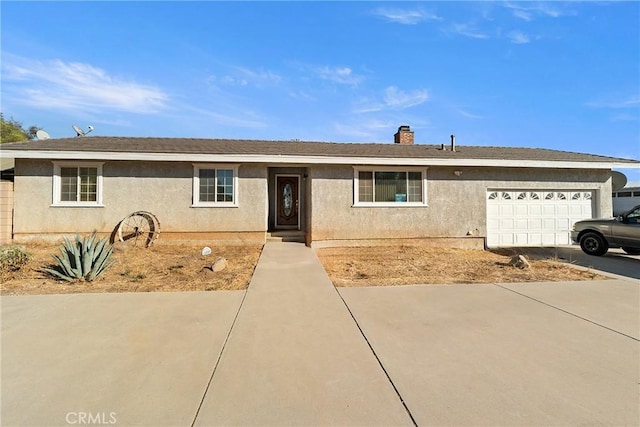 ranch-style home with a garage