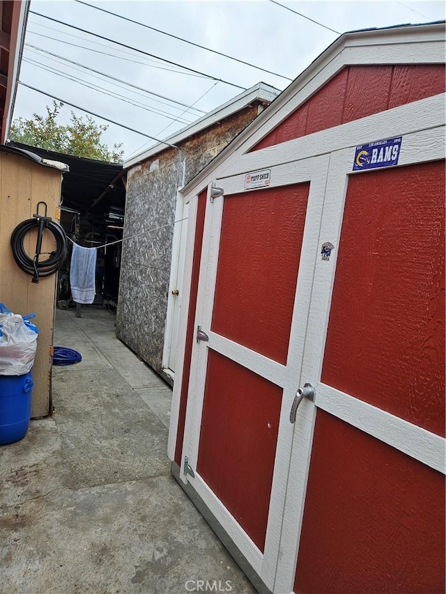 view of outbuilding featuring an outdoor structure