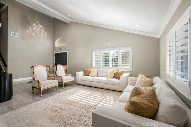 living room featuring a notable chandelier and ornamental molding