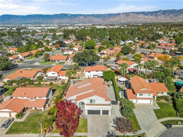 bird's eye view featuring a mountain view and a residential view