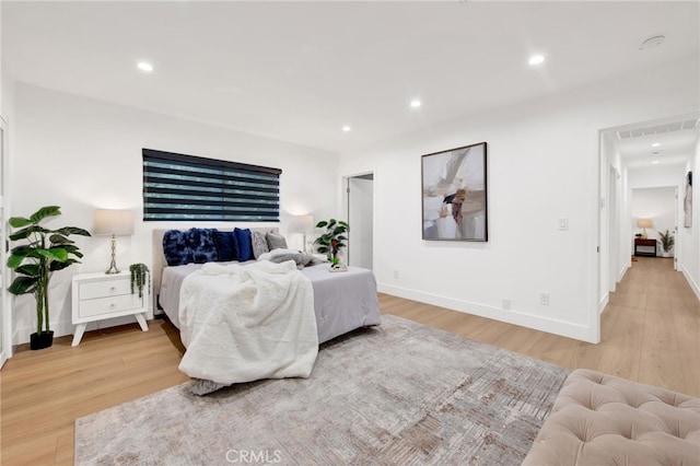 bedroom featuring light wood-type flooring