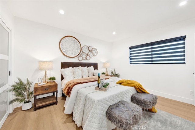 bedroom featuring light hardwood / wood-style flooring