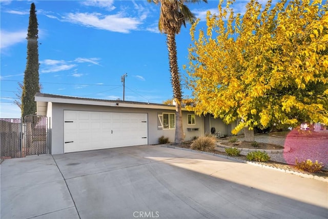 single story home featuring a garage