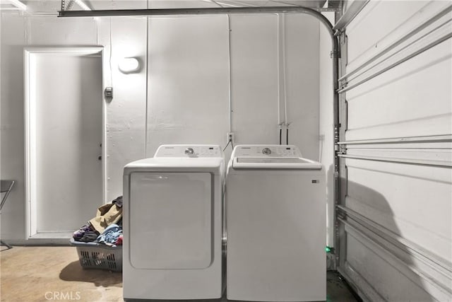 washroom featuring independent washer and dryer