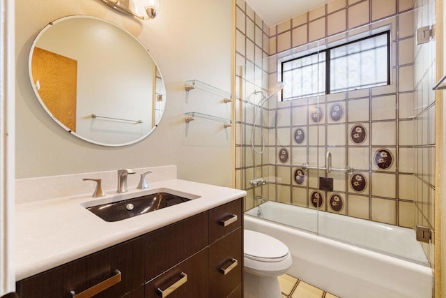 full bathroom with tile patterned floors, toilet, vanity, and combined bath / shower with glass door