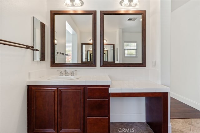 bathroom featuring vanity and tile patterned floors