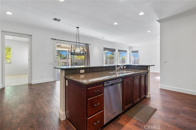 kitchen with dishwasher, sink, a healthy amount of sunlight, and an island with sink