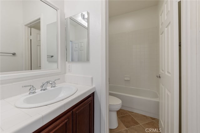 full bathroom with toilet, vanity, shower / bath combination, and tile patterned floors