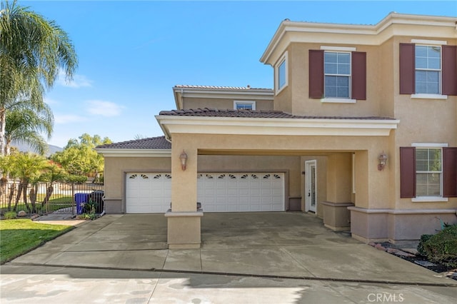 view of front of property featuring a garage