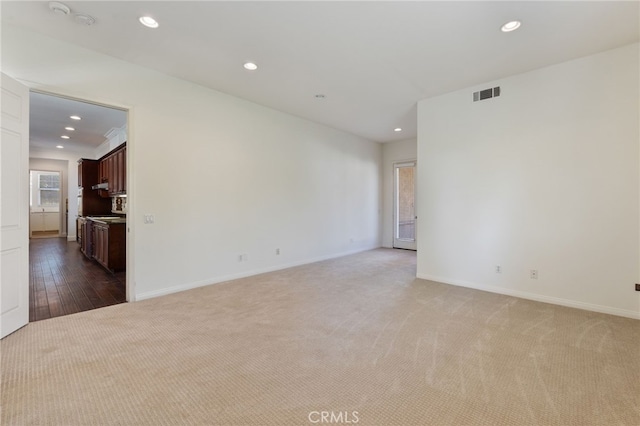 empty room with wood-type flooring