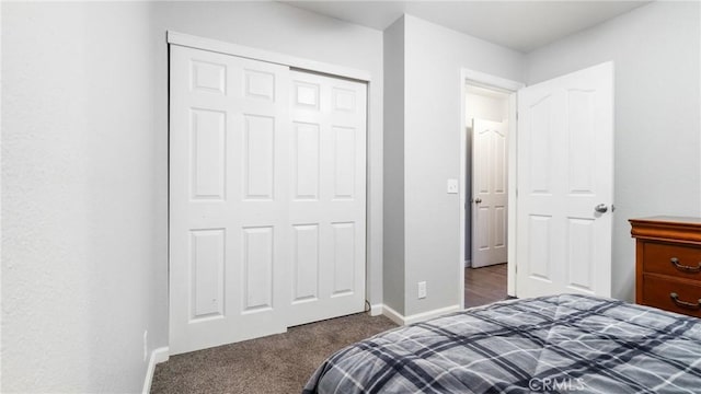 carpeted bedroom featuring a closet