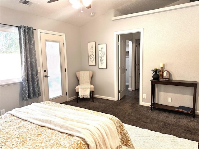 carpeted bedroom featuring ceiling fan, lofted ceiling, and multiple windows