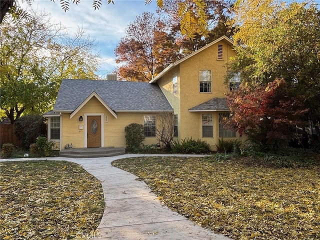 view of front property with a front lawn