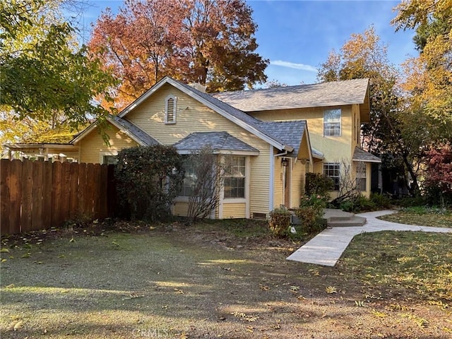 view of front of property with a front lawn