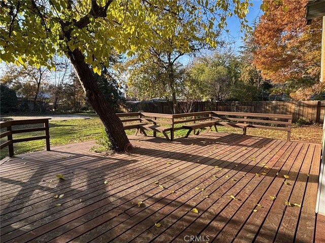 deck featuring a lawn