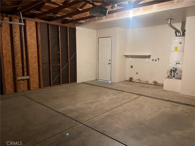 garage with water heater and a garage door opener