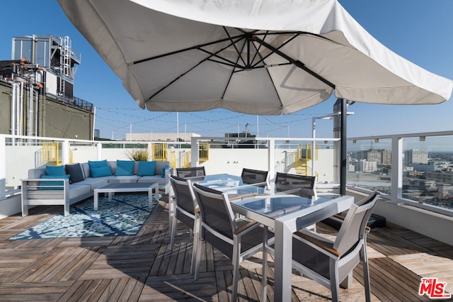 deck with an outdoor hangout area