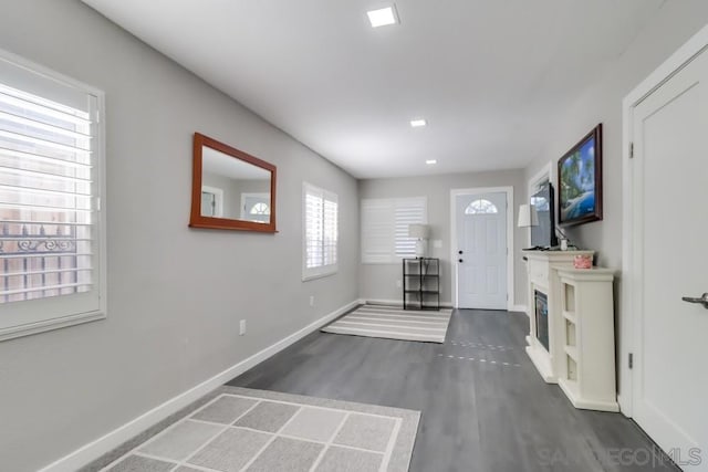 interior space with dark wood-type flooring