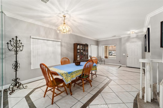 dining area featuring light tile patterned flooring, ornamental molding, and a notable chandelier