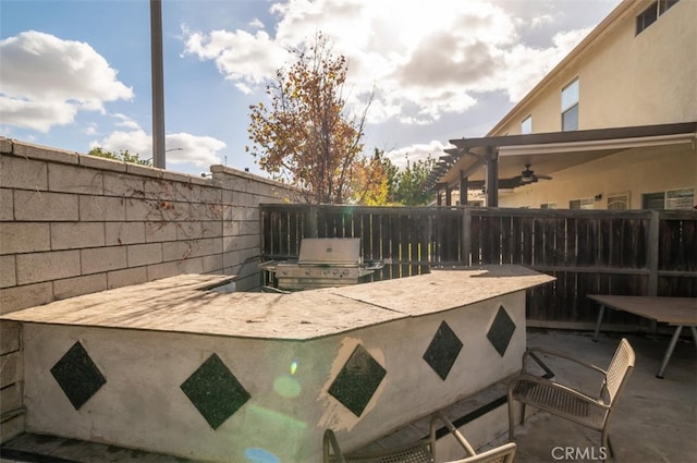 view of patio / terrace featuring ceiling fan and area for grilling