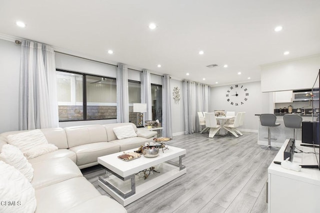 living room featuring light wood-type flooring